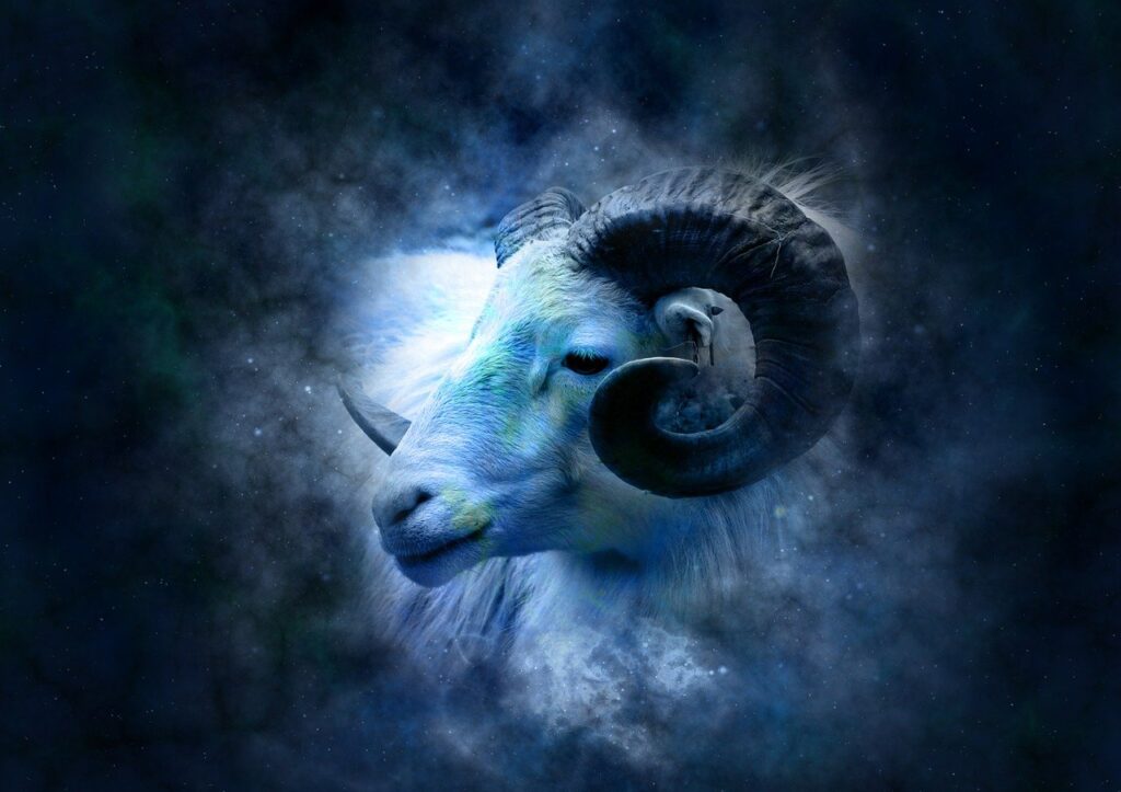 a ram with horns in the sky